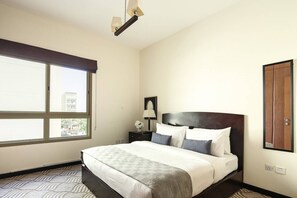 1 غرفة نوم ومساحة عمل للكمبيوتر المحمول ومكواة/لوح كي وخدمة الإنترنت