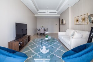 TV - Modern Luxury Living in This 3BR Apt in Downtown Dubai (Dubai)
