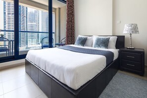 Laptop workspace, iron/ironing board, WiFi, bed sheets - Superb Studio w/ Lake Views in JLT - Near the Metro! (Dubai)