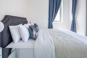 1 bedroom, laptop workspace, iron/ironing board, bed sheets