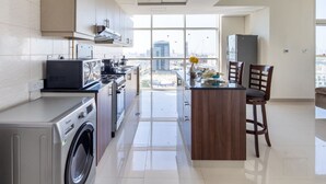 Private kitchen - Premier 2BR Apartment in JVC Community - Sleeps 5! (Dubai)