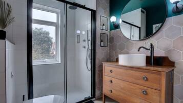 Shower, rainfall showerhead, hair dryer, towels