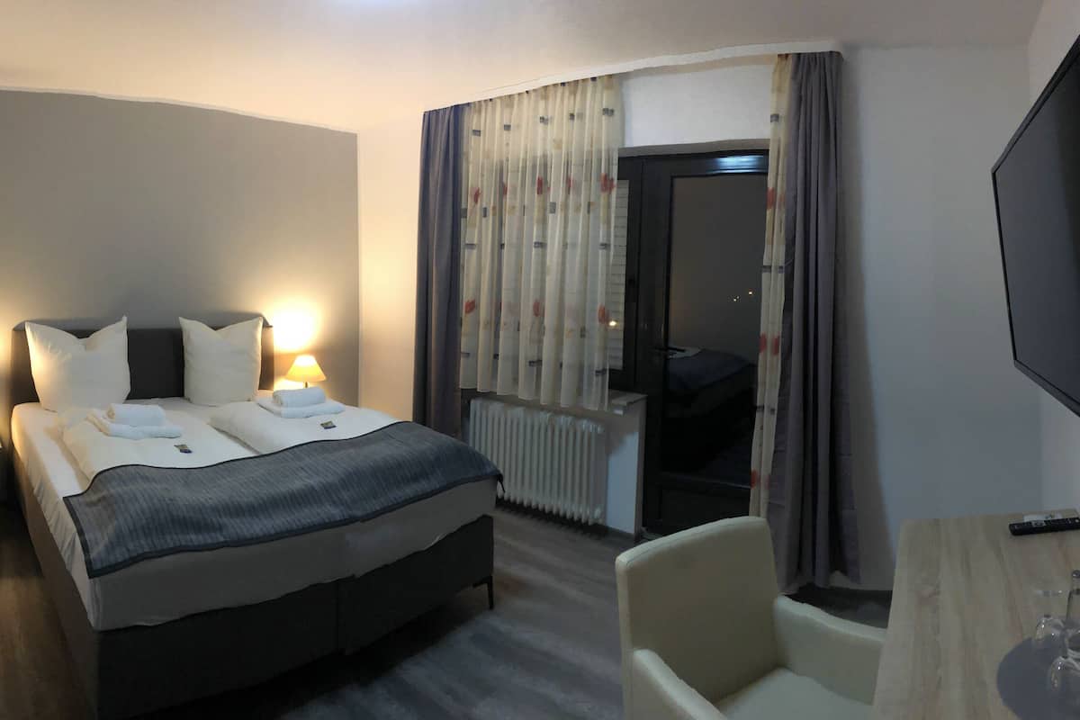 1 bedroom, desk, laptop workspace, blackout curtains