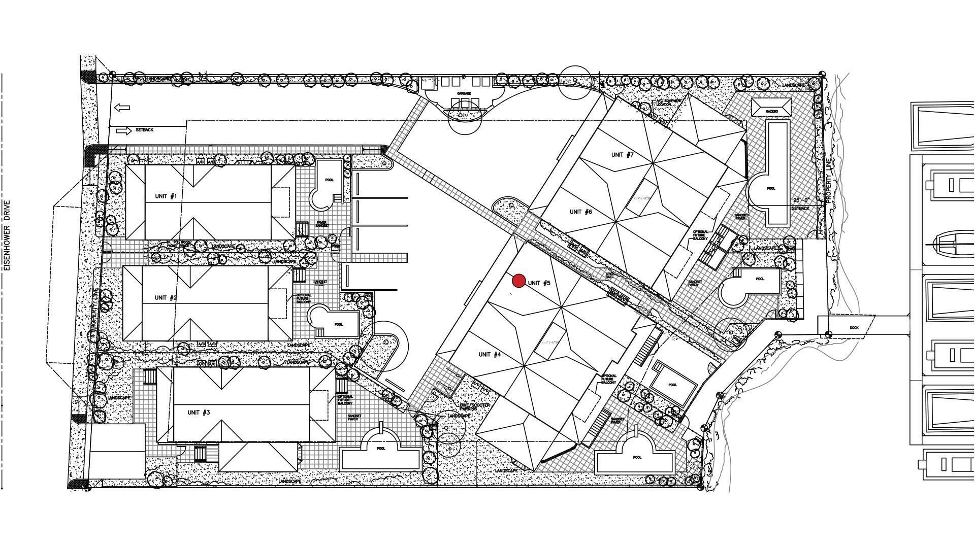 A floor plan of a hotel with multiple units, pools, and landscaped areas.