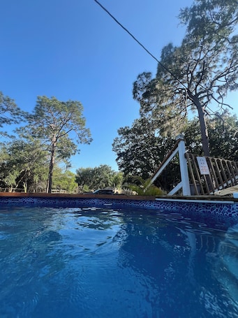 Outdoor pool. Trees Camper