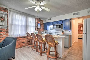 Fridge, microwave, stovetop, coffee/tea maker