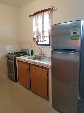 Refrigerador, horno, placa de cocina