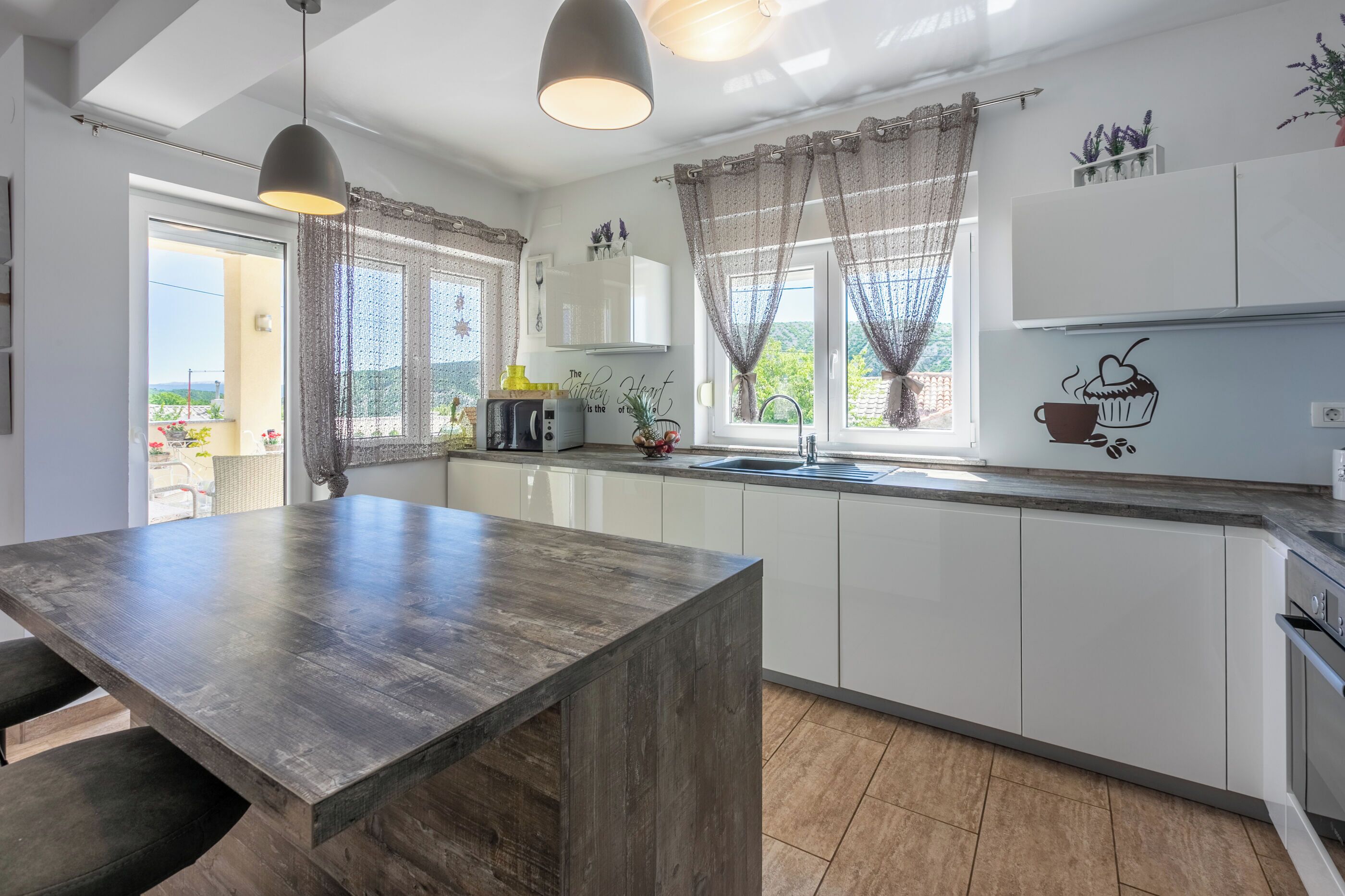 Villa | Private kitchen | Fridge, microwave, oven, stovetop