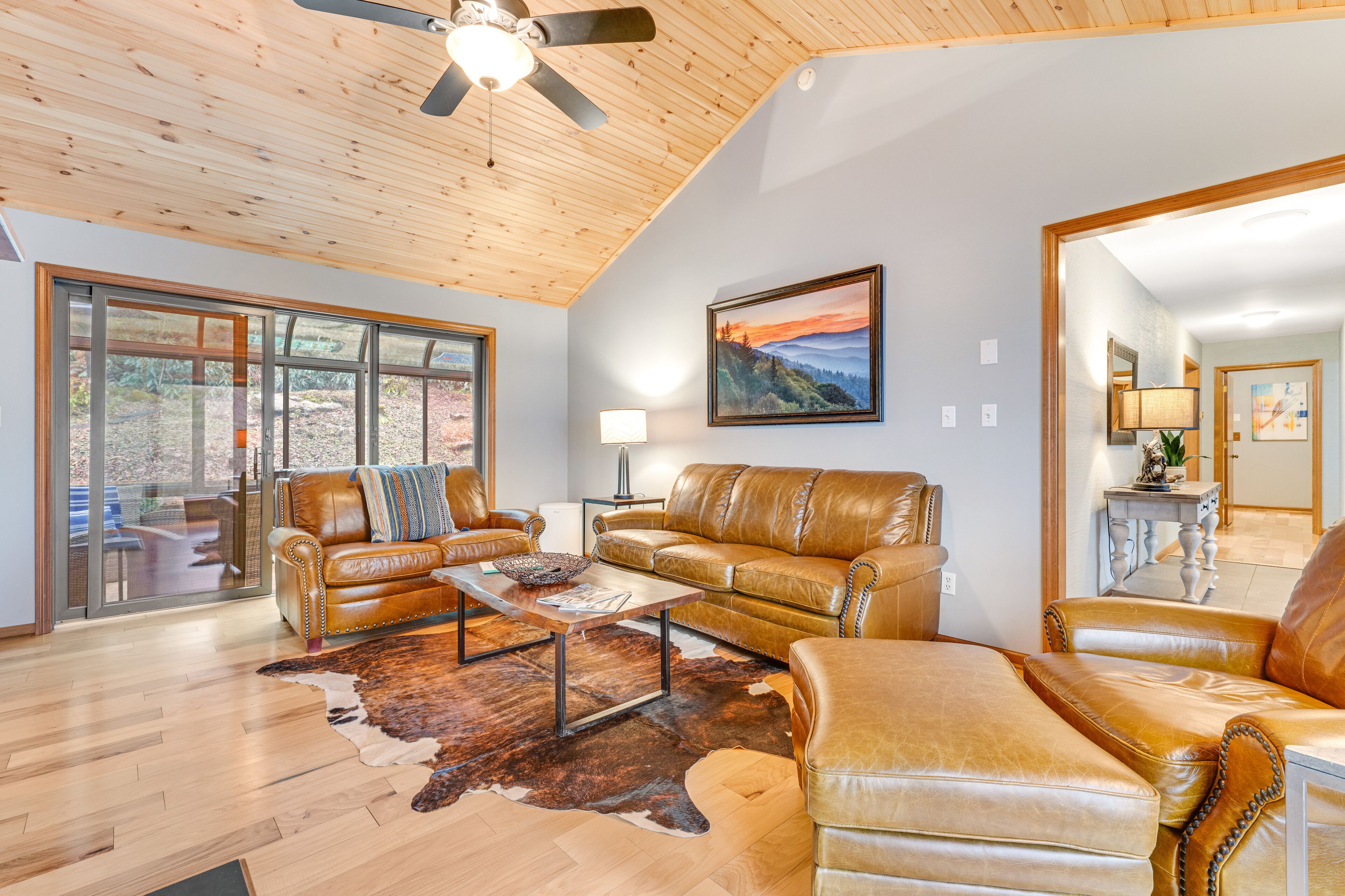 Single-story home in the woods with game room and gas fireplace