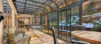 Single-story home in the woods with game room and gas fireplace