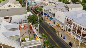 Outdoor dining - **MAYA’S SECRET TREASURE @ DUVAL** Pool & Balcony over Duval + LAST KEY SERVICES (Key West)