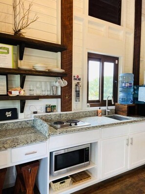 Fridge, microwave, stovetop, coffee/tea maker