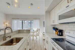 Fridge, microwave, oven, stovetop - Sea Colony Tennis condo w/ free WiFi, pool, and shared sauna (Bethany Beach)