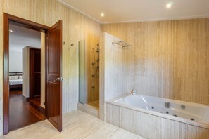 Bathtub, hair dryer, towels