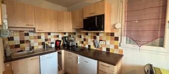 Lovely T2 cabin apartment with lake view, balcony, and covered parking