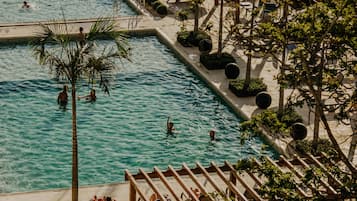 Indoor pool, pool umbrellas, pool loungers