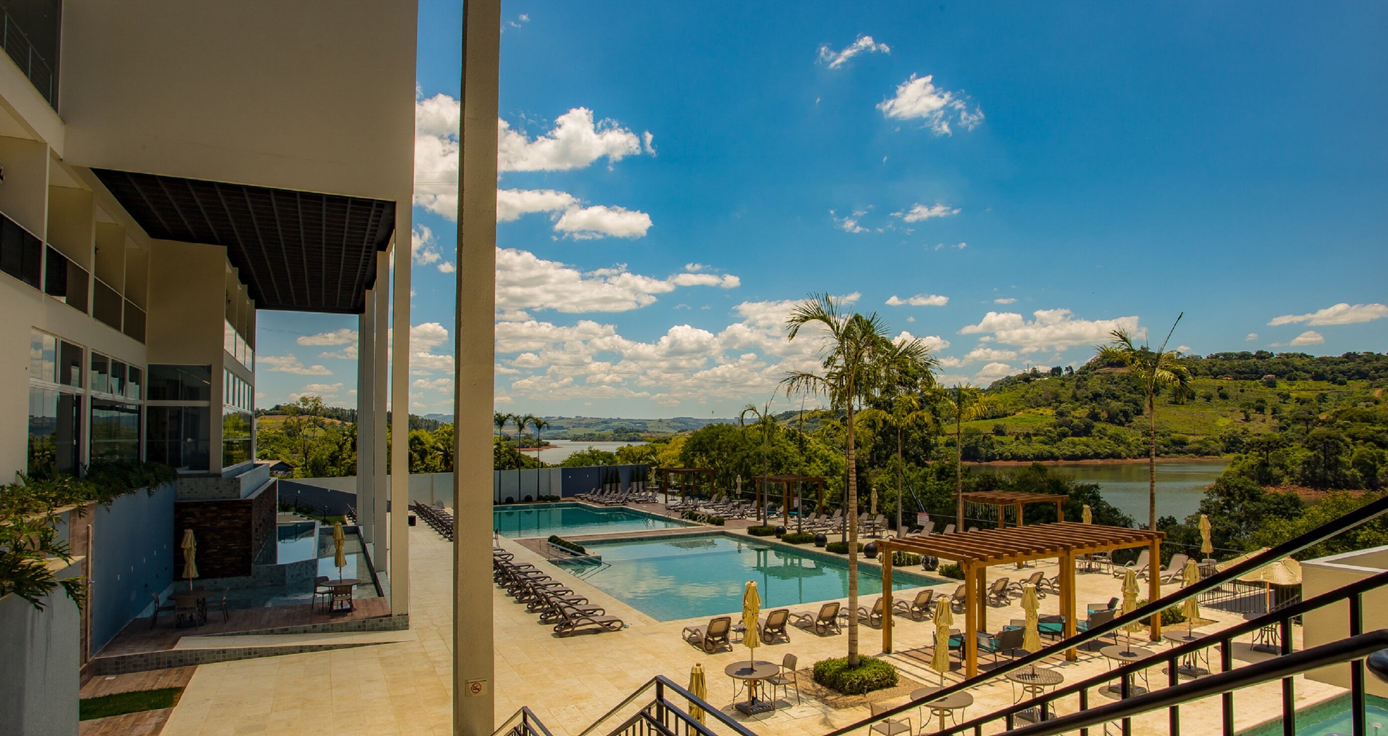 indoor pool, 3 outdoor pools, open 8:00 am to 10:00 pm, pool umbrellas