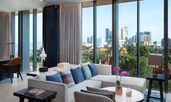 Executive Suite, 1 King Bed | Living area | 65-inch Smart TV with satellite channels, TV