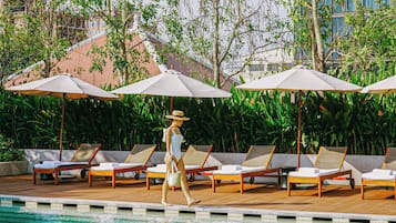 Outdoor pool, open 6:30 AM to 6:30 PM, free cabanas, pool umbrellas