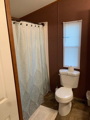 Combined shower/bathtub