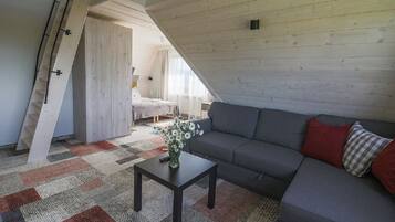 Deluxe Apartment (8) | Living room | Flat-screen TV