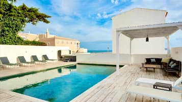 Outdoor pool, sun loungers