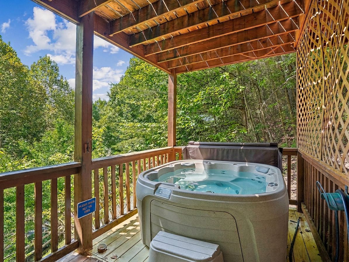 A hot tub on a wooden deck with a view of a forest.