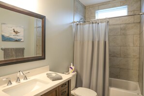 Combined shower/bathtub, hair dryer, towels, soap