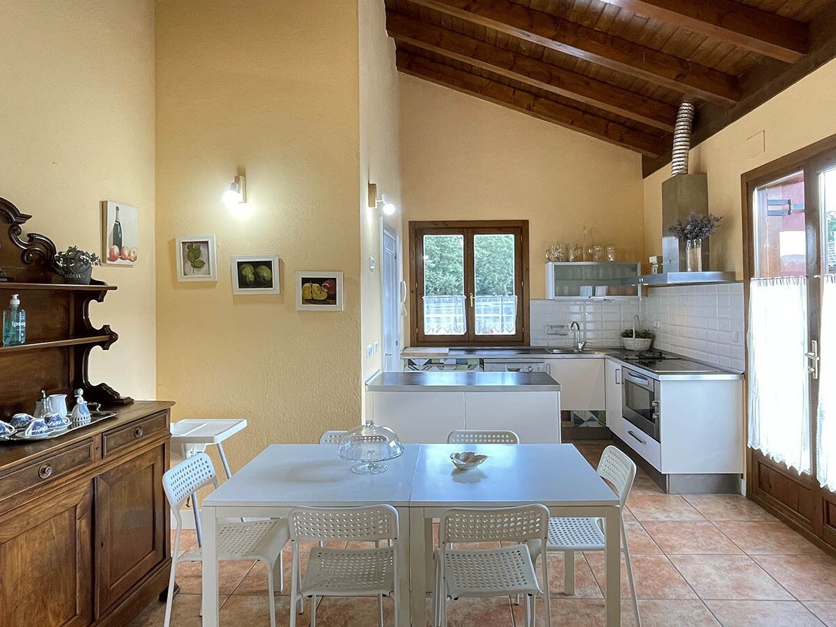 Casa Orgi, surrounded by meadows and horses.