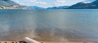 Executive Lakeshore Condo bordering the lake, the KVR trail and Lions Gardens.