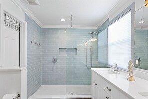 Combined shower/tub, hair dryer, towels, soap