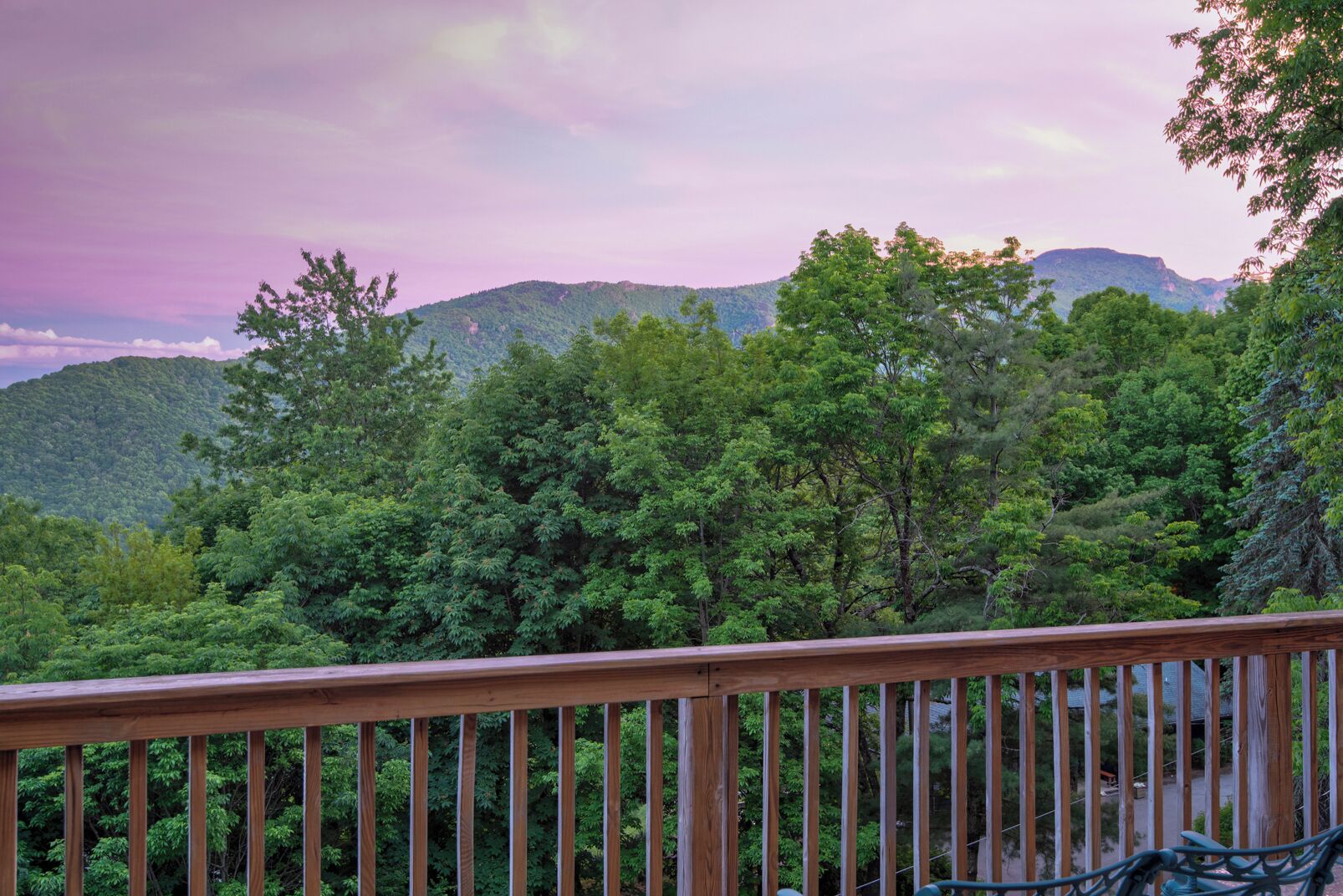 Evenings like this are why you came. Sweeping Blue Ridge views paint the sky in pink from the deck at A Big View.
