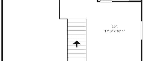 Plano de planta de un loft que incluye un baño con inodoro, lavamanos y bañera.
