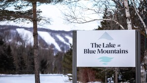 A sign with the text "The Lake at Blue Mountains" and a mountain icon. - Mountain View Boutique Suite with contactless entry - The Lake at Blue Mountains (The Blue Mountains)