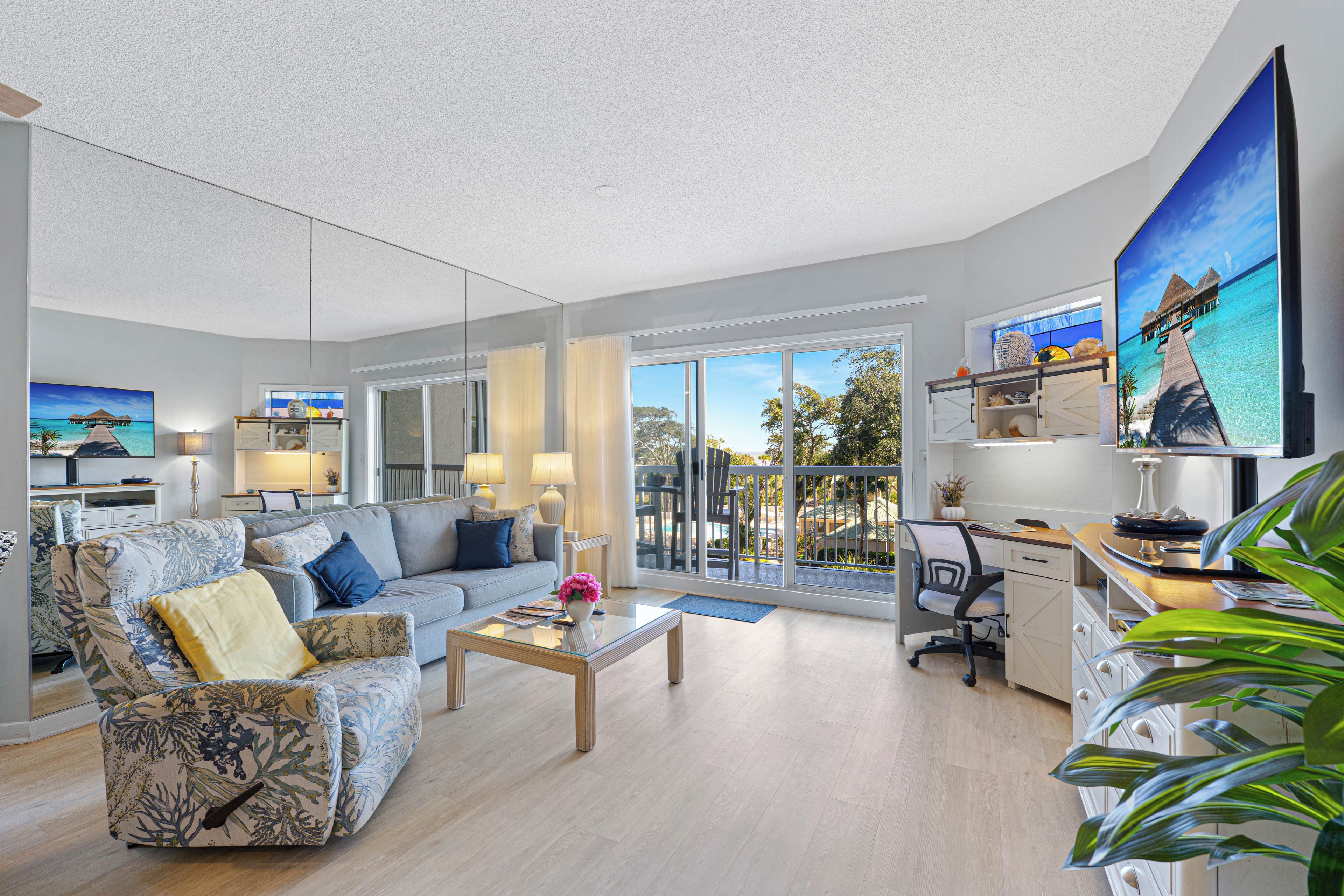 Bright and inviting, this living area is designed for relaxed coastal living.