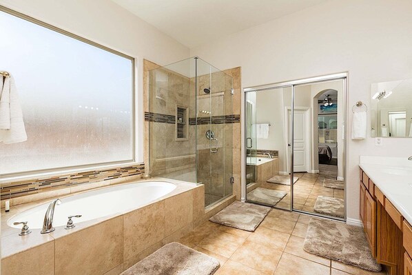 Combined shower/tub, hair dryer, towels, shampoo
