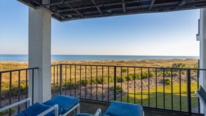 A balcony with a view of the beach and ocean. - Beachfront Sea Cloisters Villa w Ocean Views, Balcony & Complex Pool (Hilton Head Island)