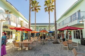 Outdoor dining - Spacious, Family-Friendly Condo with Ocean View and Across from No-Drive Shore (New Smyrna Beach)