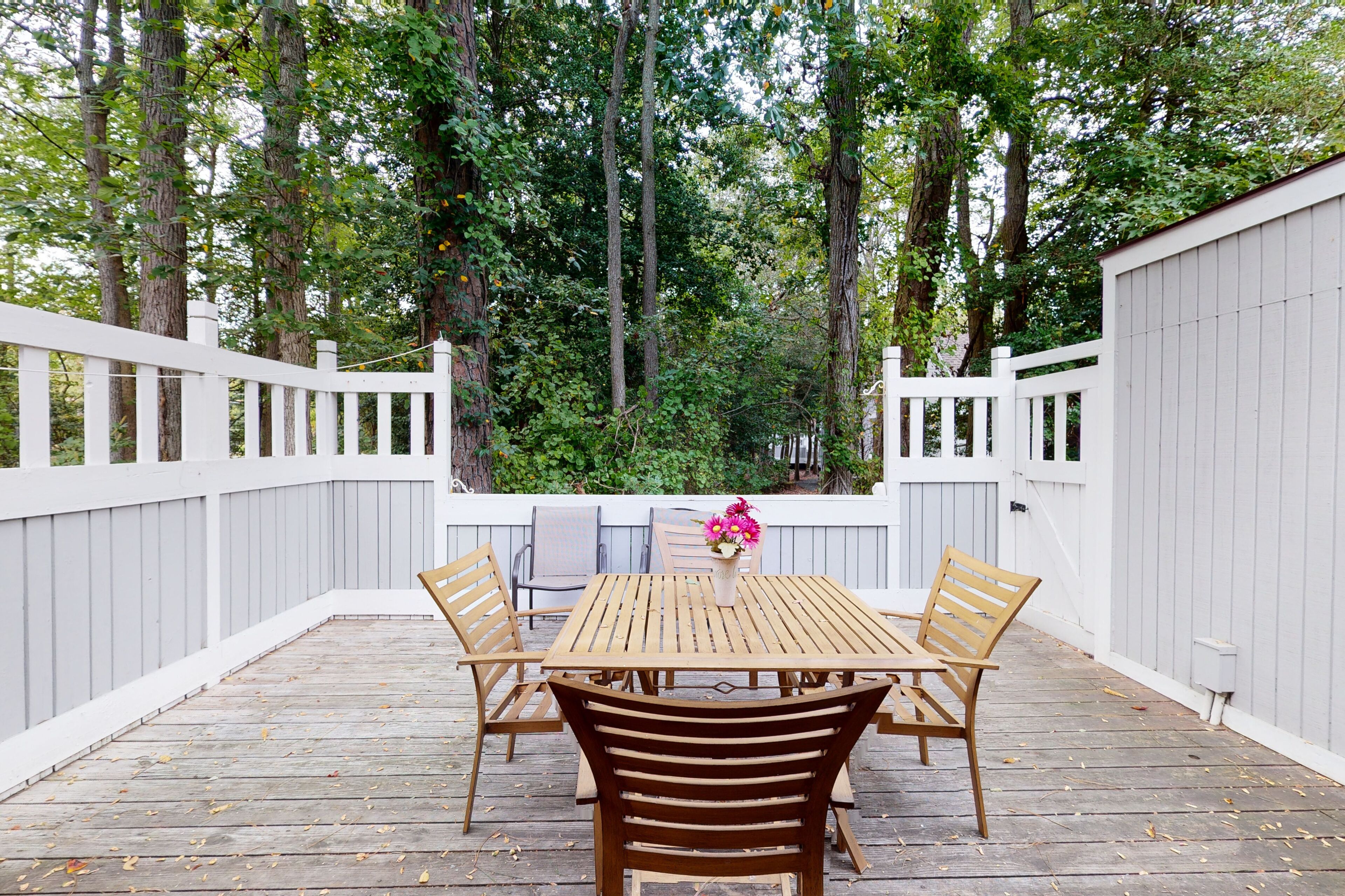 First-floor Sea Colony Tennis condo with pool/basketball court