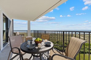 Elevated views and direct boardwalk access nearby keep the beach experience front and center without leaving your rental.