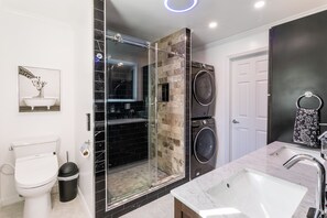 Combined shower/tub, hair dryer, bidet, towels