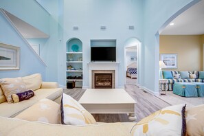 Televisión, chimenea, reproductor de DVD