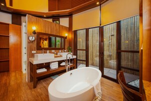 Premium Villa, 1 King Bed | Bathroom | Separate tub and shower, free toiletries, hair dryer, bathrobes