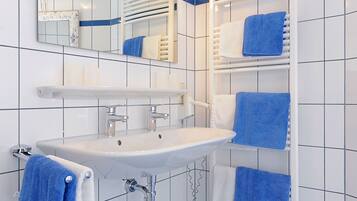 Hair dryer, towels, soap, toilet paper