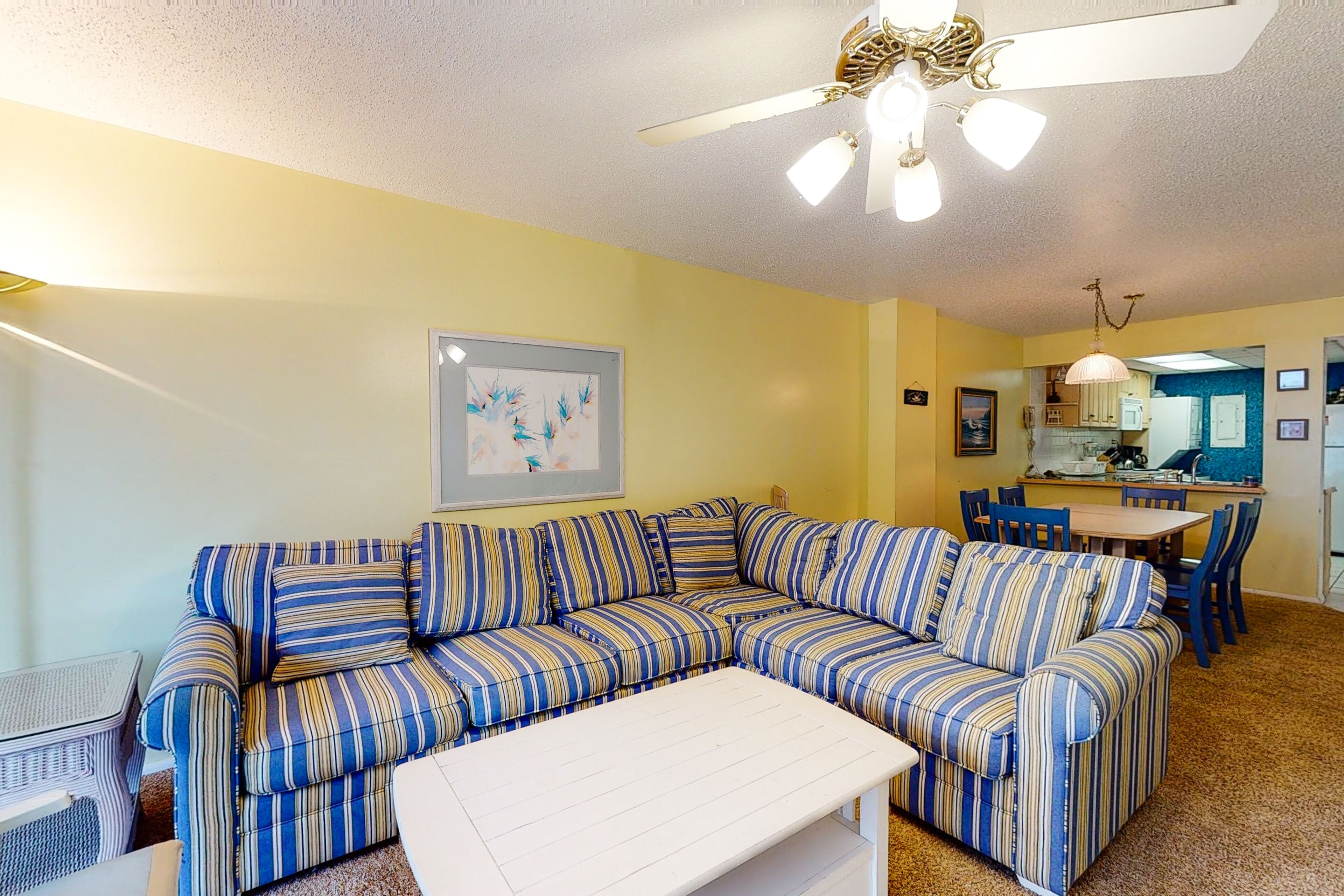 1st floor Sea Colony condo with shared gym, tennis court, and elevator