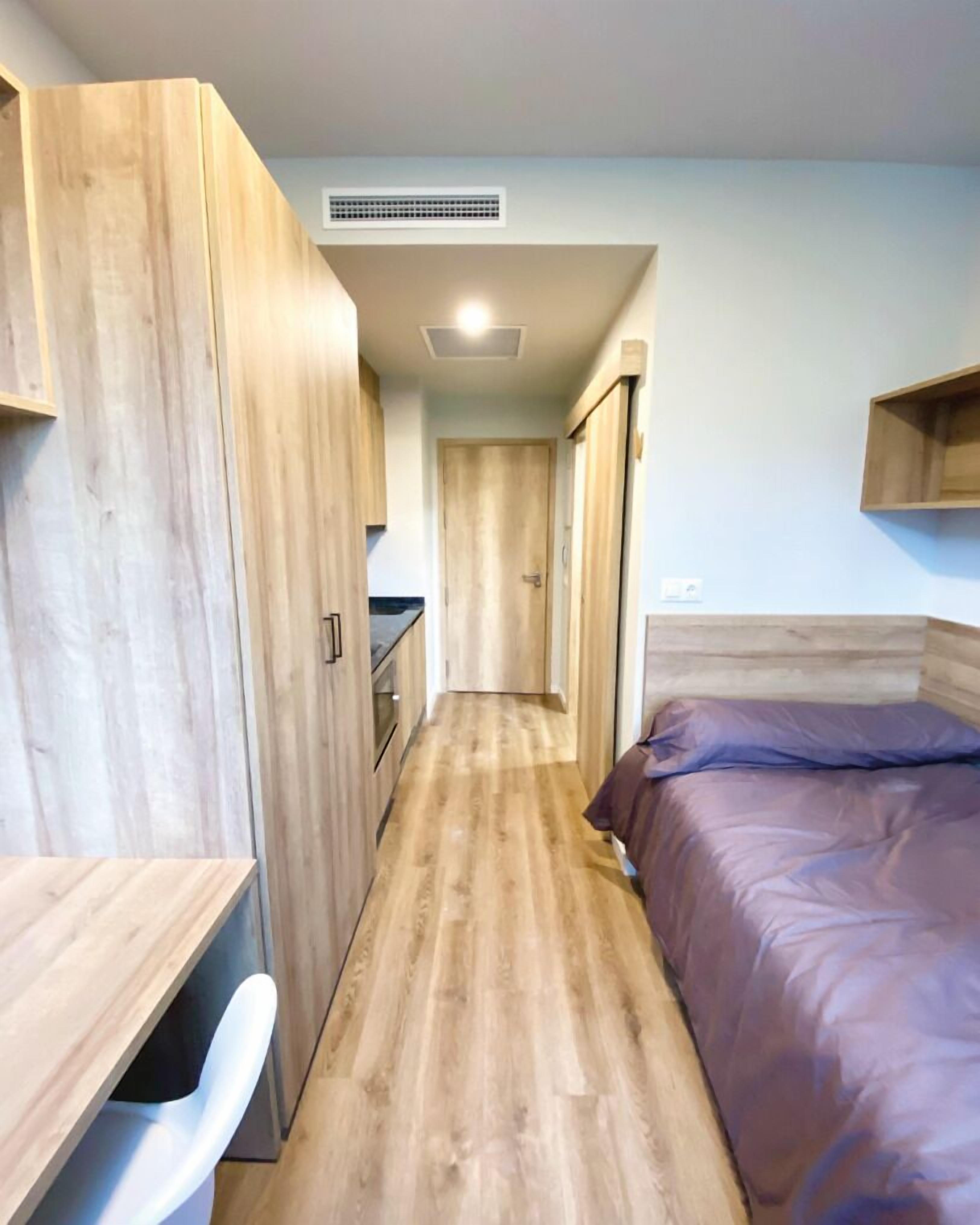 single room | down duvets, desk, laptop workspace, blackout curtains