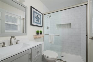 Shower, towels - 5212A- Cotton's Cabana, 3-bedroom duplex in KDH, NC, pet friendly, just steps from the beach. (Kill Devil Hills)