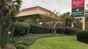 A Red Roof Inn sign with a Home Towne Studios by Red Roof logo. - HomeTowne Studios By Red Roof Augusta (Augusta)