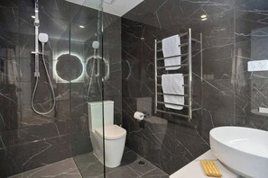 Bathtub, hair dryer, towels