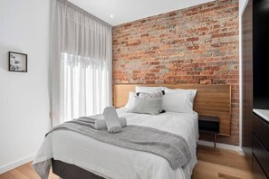 2 bedrooms, travel crib, WiFi, bed sheets